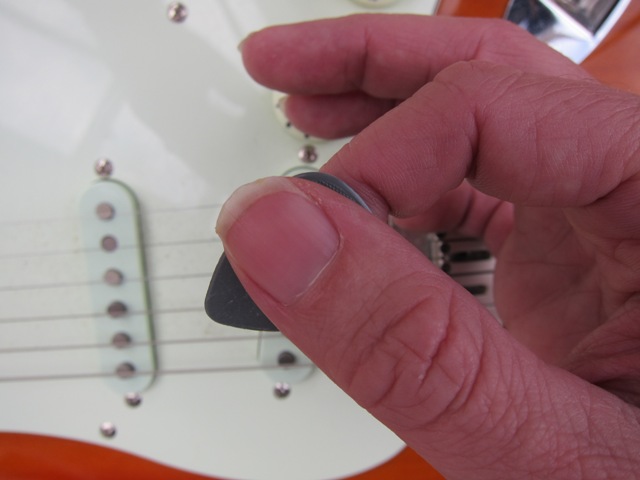 Holding deals a plectrum