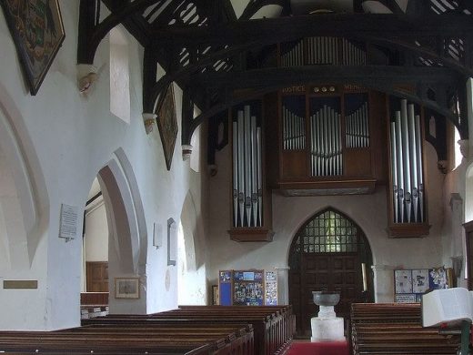 Sacha Tomkins Organist organist's photo of church interior with organ pipes
